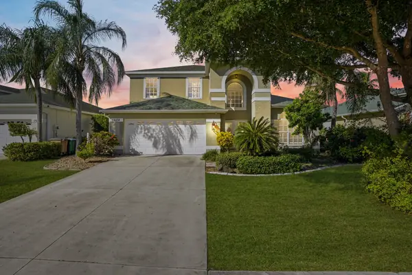 1624 Emerald Cove Dr, Cape Coral, front of the home at twilight