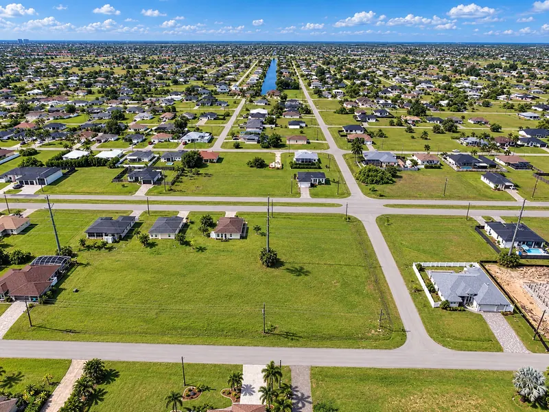 Aerial view of newer homes and open lots in Northeast Cape Coral
