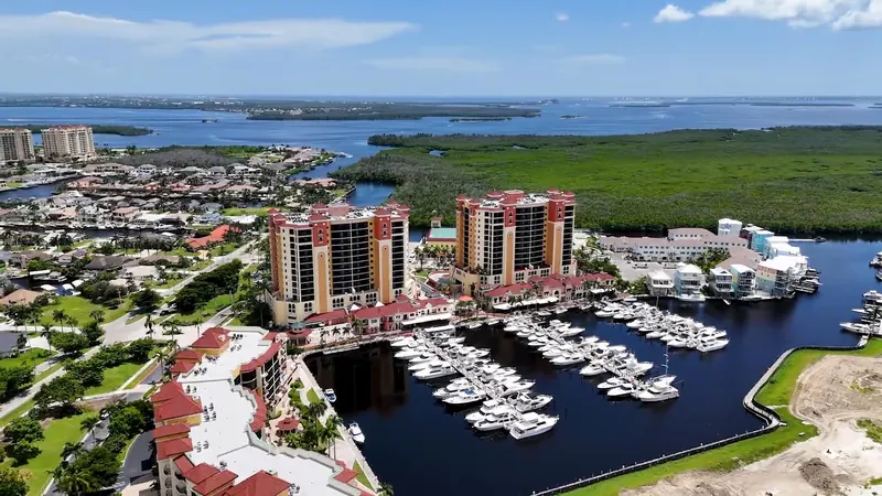 Aerial view of the Tarpon Point marina with the Gulf beyond